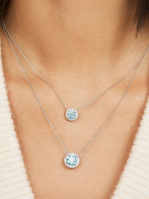 Model image of 1 carat and 2 carat blue halo pendants